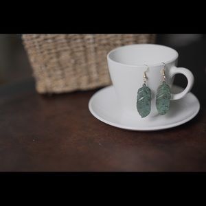 Teal painted metal boho feather earrings